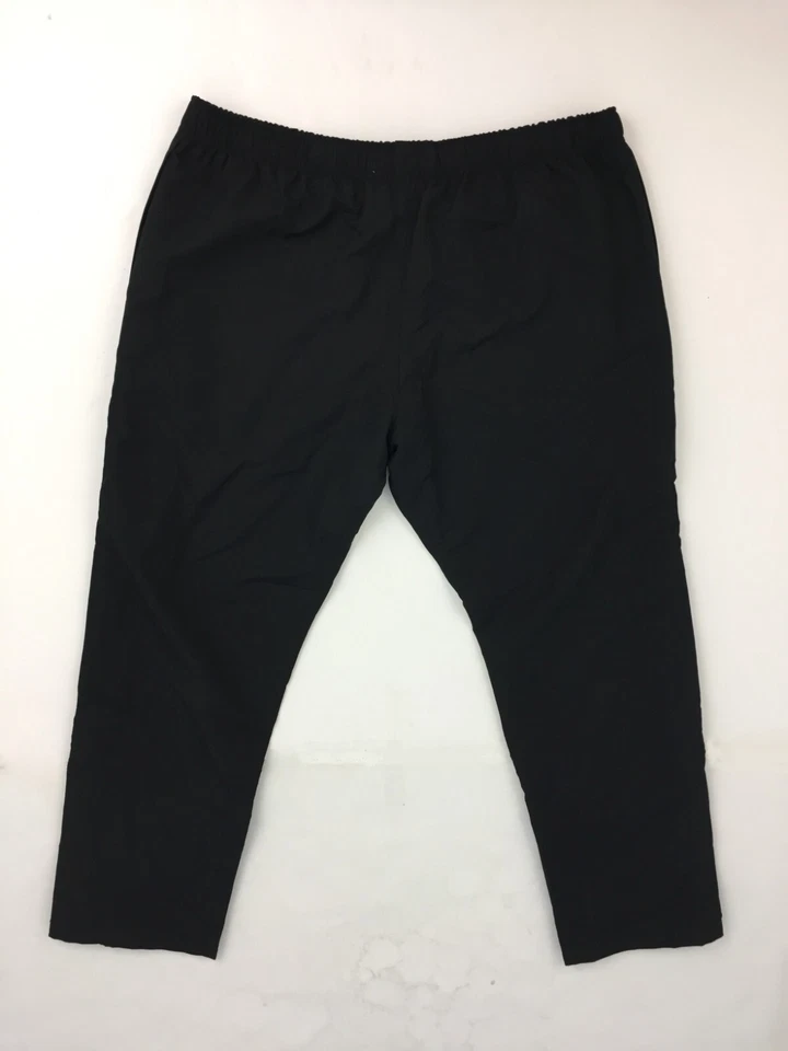 Pantalones para mujer Canterbury Stadium negros dobladillo abierto bolsillos con cremallera cintura elástica nuevos F1 Foto 3 de 4