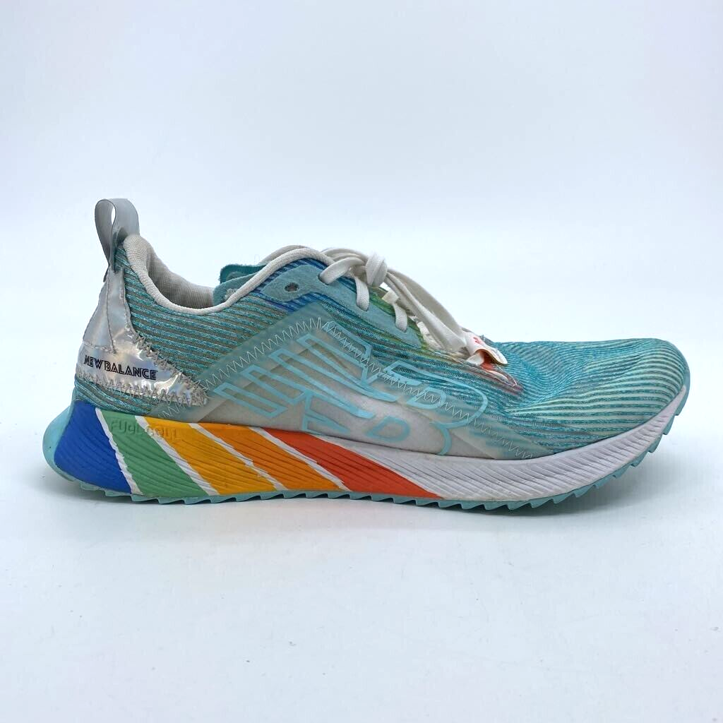 New Balance Womens 11 D Pride Flag Fuelcell Echolucent Running Shoe Blue  Lace Up
