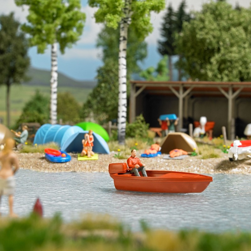 Lac avec bateau en mouvement pour animer les paysages et décors de réseaux