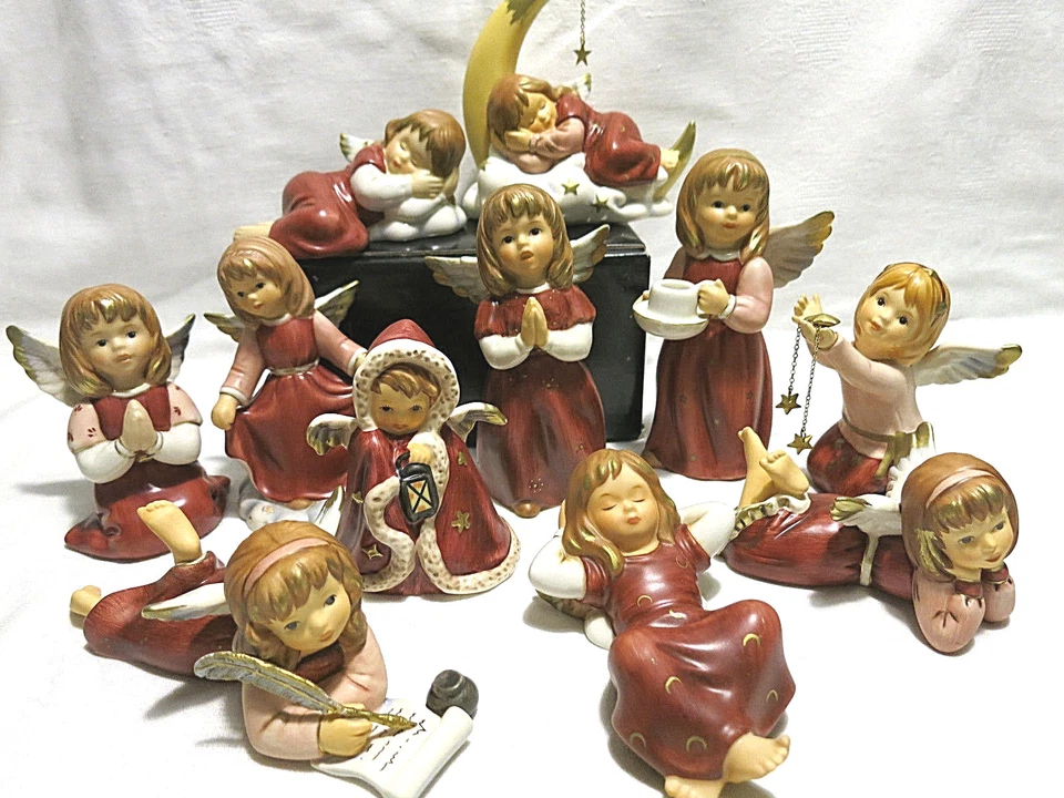 Ángel Goebel soñador en la luna con estrellas rezando con linterna bosque de invierno