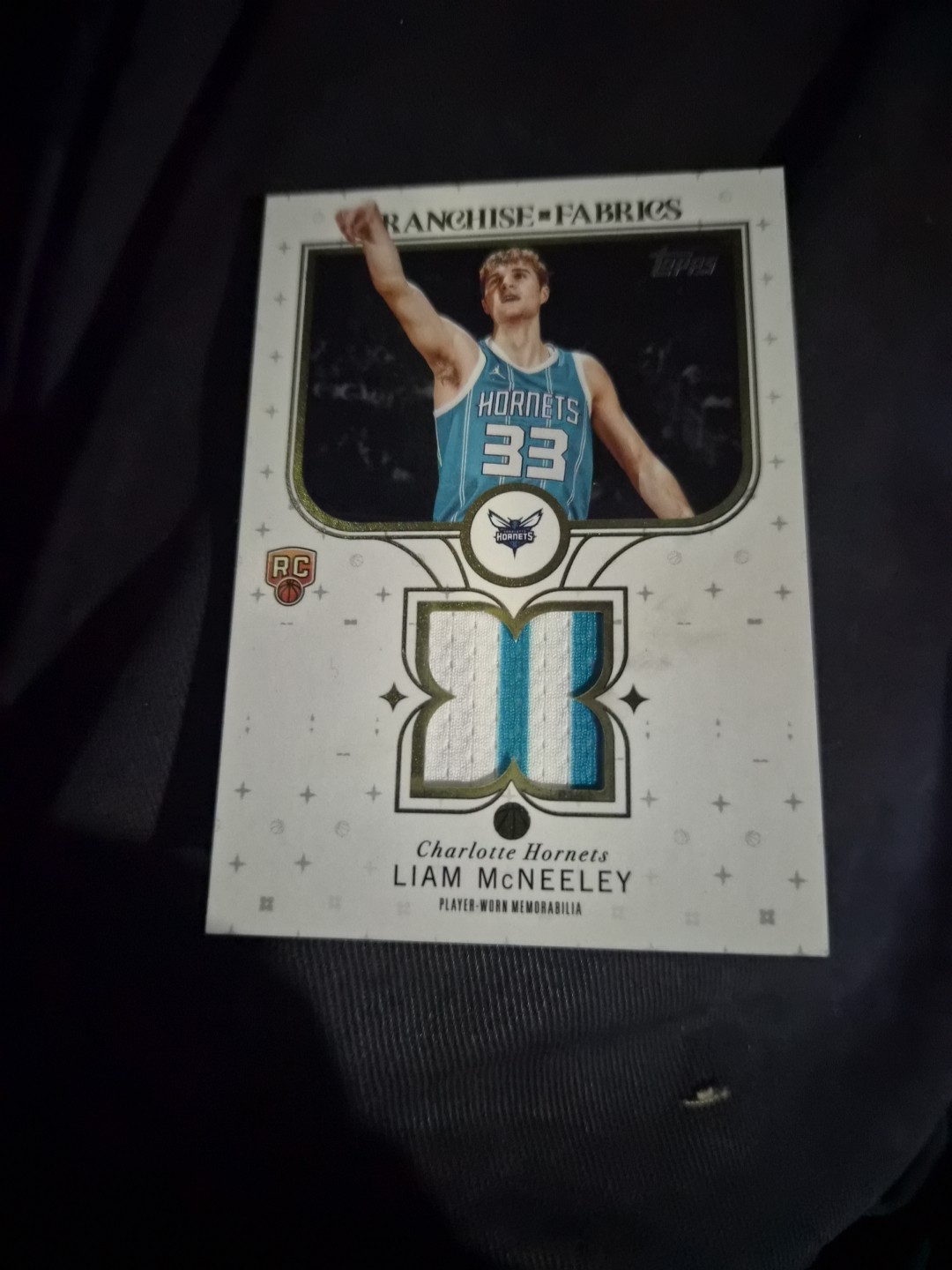 2025/26 Topps Basketball Franchise Fabrics SSP - Liam McNeeley (RC) FF-LM