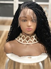 braided wig made on a full lace wig.length is 16inches.color black.READY TO SHIP