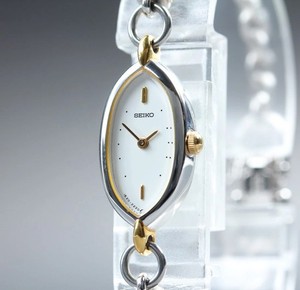 SEIKO 1E20-0D70 QZ 白 SS 不動 サファイヤ ヘキサゴン Vintage Seiko 1E20 0D70 White Dial Lady Quartz Watch Japan