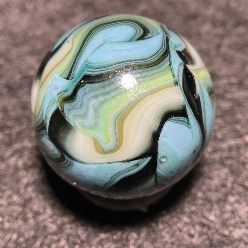 Jabo Marbles-Joker Elite-Striated Sea Green/Black/Sky Blue/Gold Av Swirl(.72")