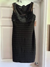 womens little black dress with rose detail, size 4, new