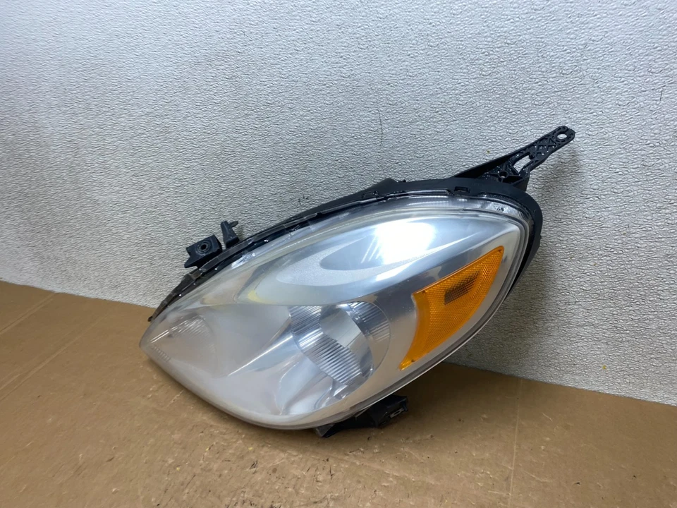 Faro conductor izquierdo Nissan Versa 2012 2013 2014 sedán LH V5126 DW Foto 2 de 4