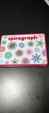 Vintage Spirograph in a metal case, 2012 Hasbro, Kahootz,LLC,Design pad and book