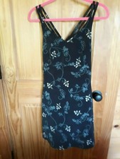 Medium little black dress,My Michelle, floral print, spaghetti strap & zipper 