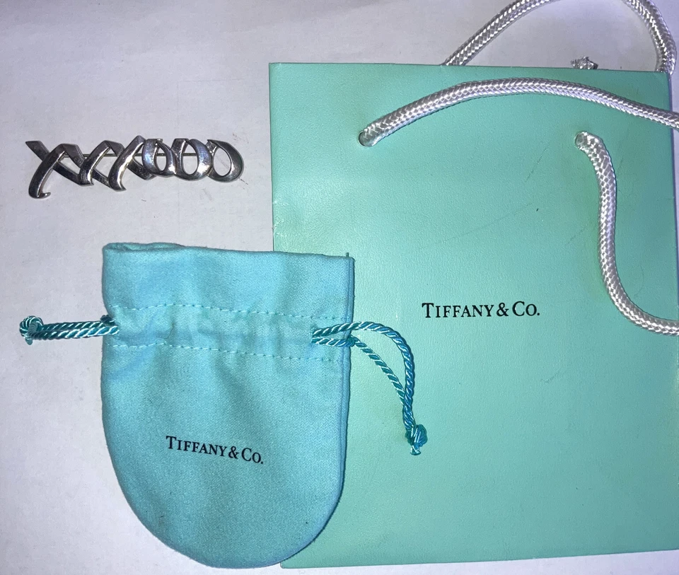 Auténtico broche grande Tiffany Co Paloma Picasso abrazos y besos de plata de ley.
