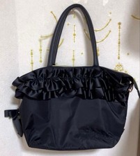 Rilakkuma Tote Bag with Ribbon Charm, with Shoulder StrapNote: The user asked