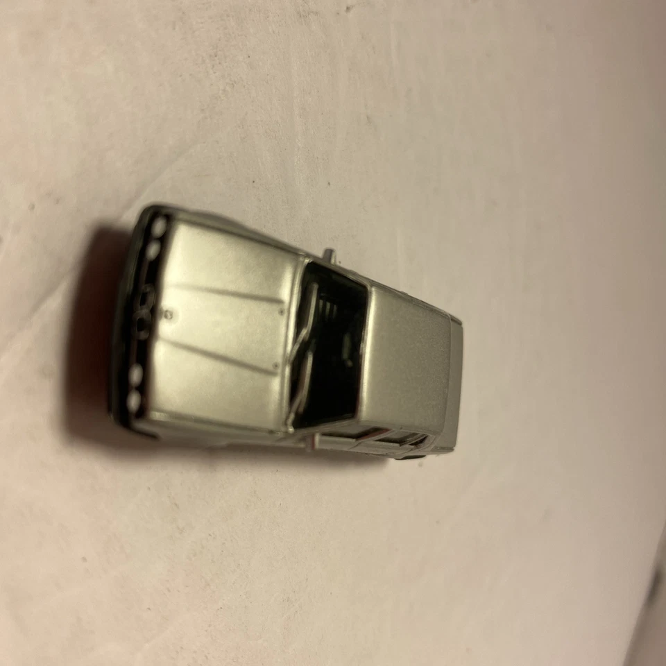 Coche vintage Herpa plateado BMW 325i escala 1:87 con Alemania Foto 3 de 4