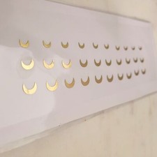 Bold Crescent Moon Bindis in Gold color.