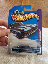 Hot Wheels '69 Chevelle SS 396 die-cast vehicle. "HW Showroom" series