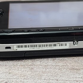 Sony PSP-1001 Console with Battery, Charger and 3 Games Bundle - USA