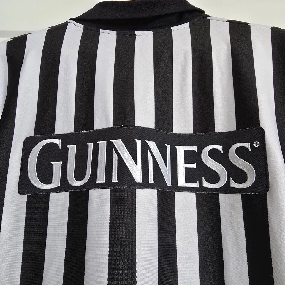 Camiseta deportiva Guinness Rugby Fútbol Árbitro Hombre Grande Negra Blanca Arpa Dorada Foto 2 de 4