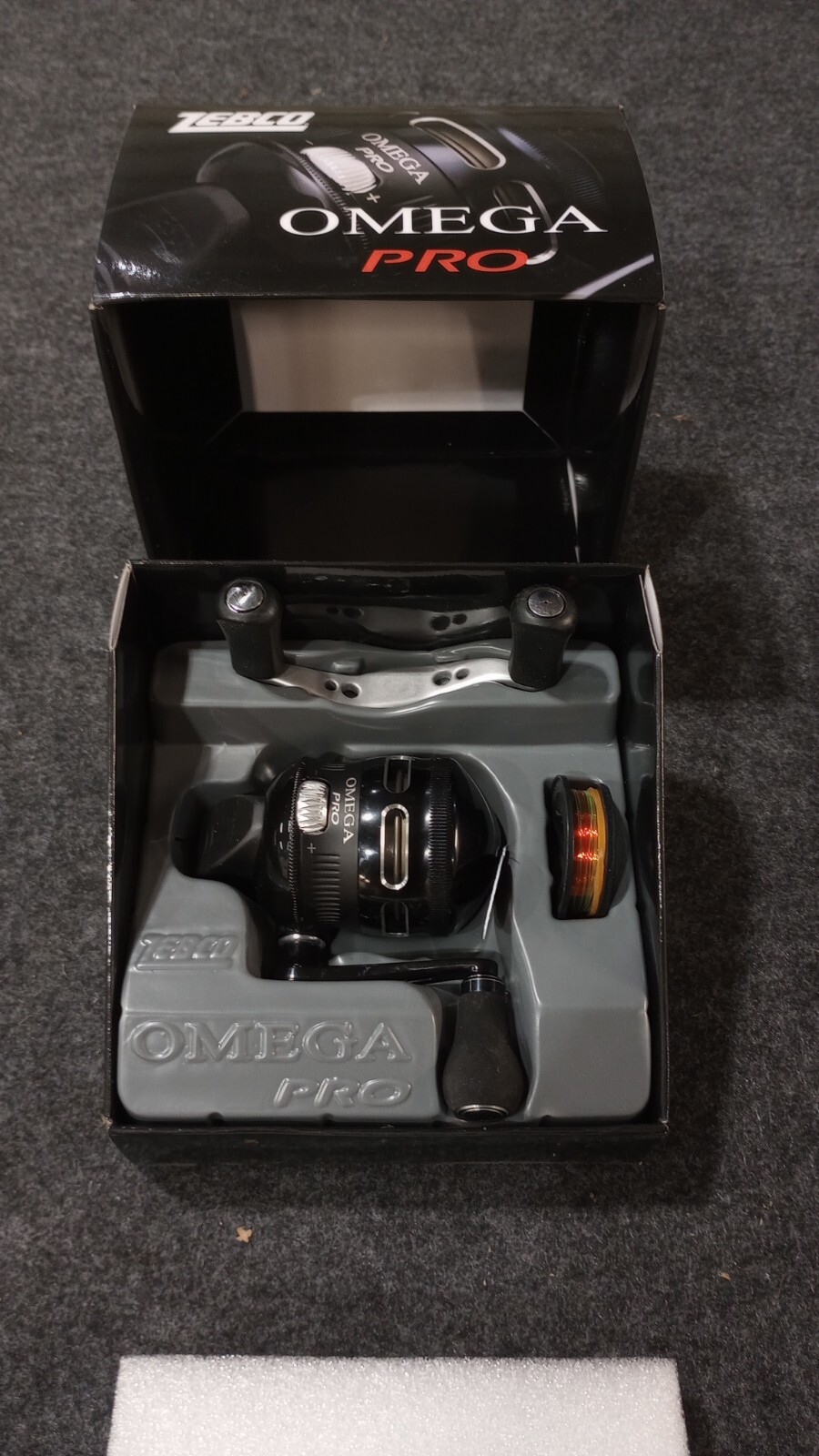 ZEBCO OMEGA PRO 2 Z02PRO 3.4:1 W/6LB LINE 7 BEARING SPINCAST REEL