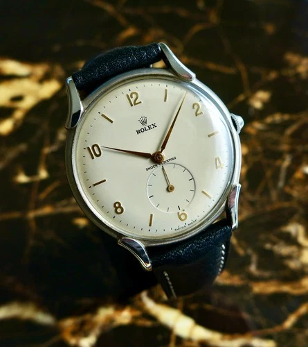 A STUNNING GENTS VINTAGE 1947 OVERSIZE 35MM ROLEX PRECISION FANCY LUGS REF. 4498