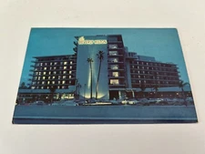 The Beverly Hilton Night Scene with Old Cars Beverly Hills California Postcard