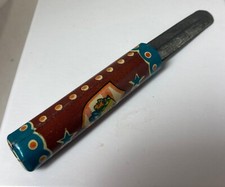 Vintage Tin Toy Knife with Native American headshot on handle