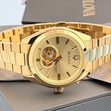 Men's Bulova 97A182 Surveyor Champagne Dial Gold-Tone Stainless Automatic Watch