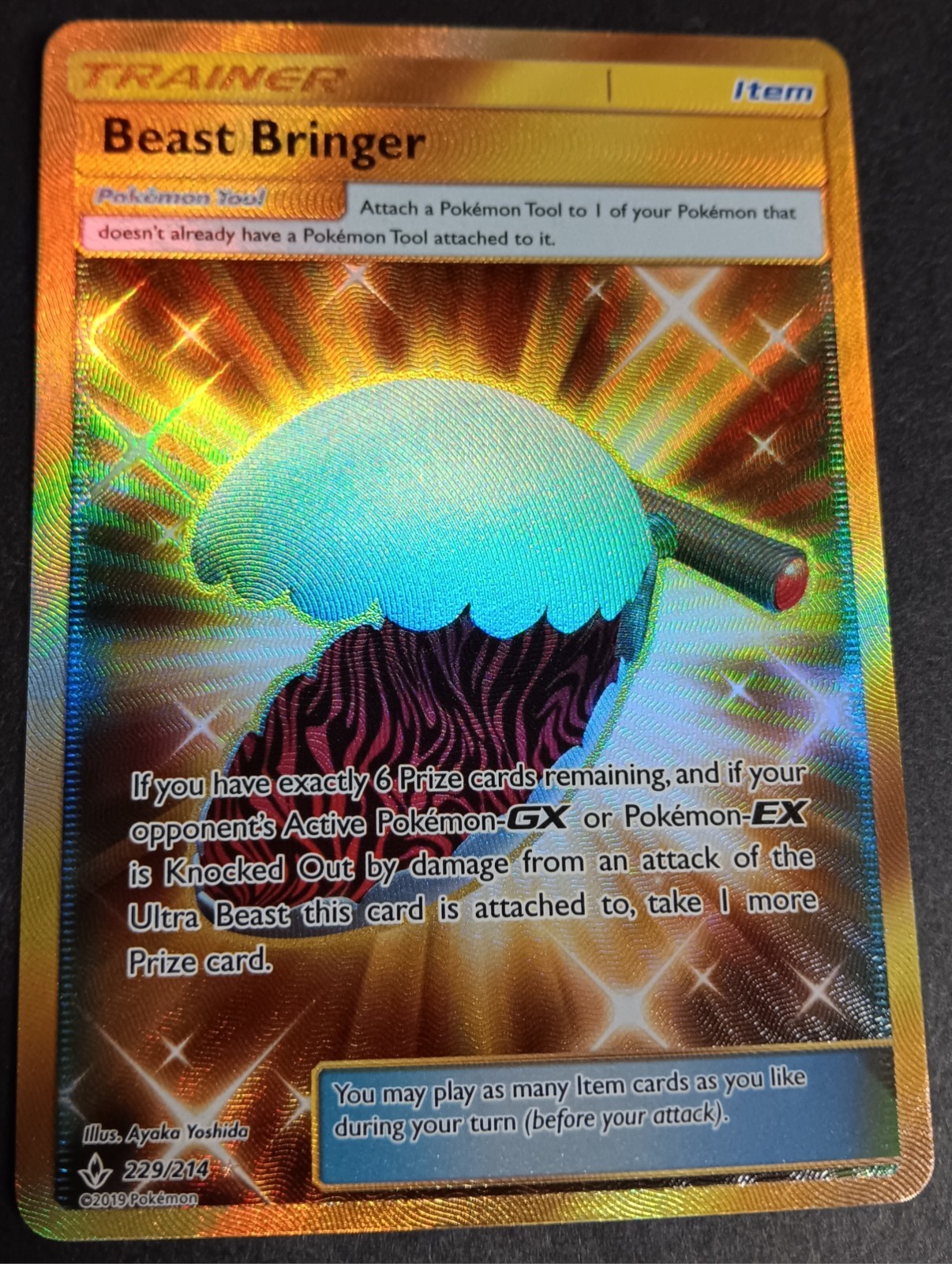 Pokemon - Beast Bringer 229/214 - SM Unbroken Bonds - Full Art Secret GOLD - NM