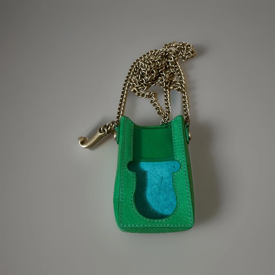 Mini estuche vintage y2k Juicy Couture verde iPod cadena dorado detalles de corazón Foto 2 de 3