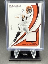 2024 Panini Immaculate Collection - Trey Hendrickson #76 Red /65 (MEM)