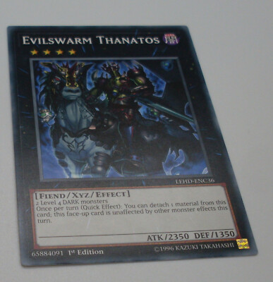 Yu-Gi-Oh Karte - Evilswarm Thanatos - Fiend / XYZ / Effect schwarz - Yugioh Neu