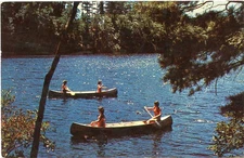 Fremont CANOE BOATING GREETINGS Michigan Postcard 22670