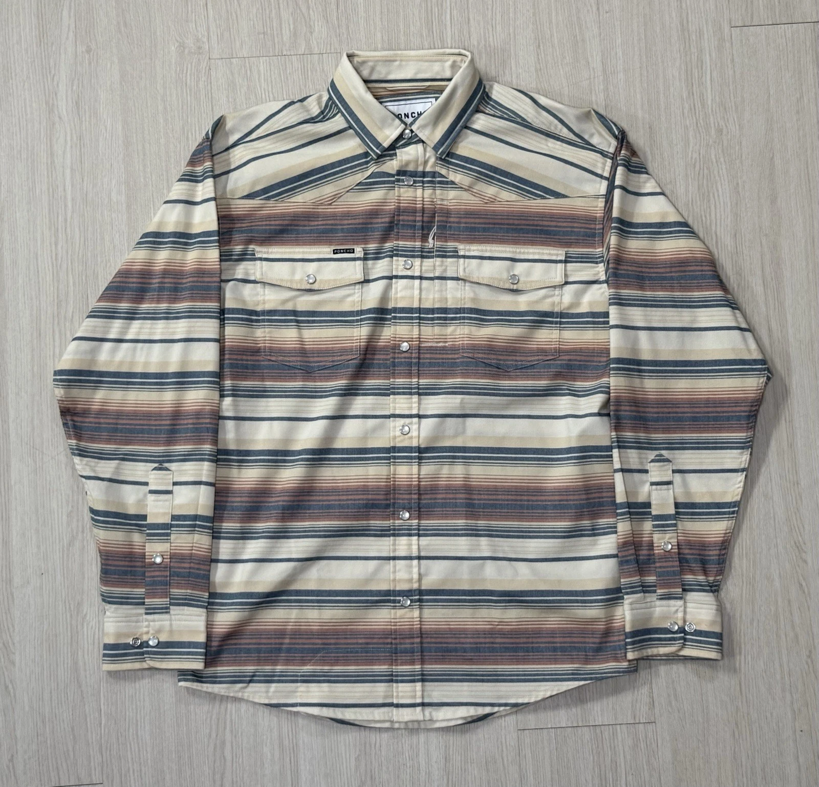 Poncho Outdoors ‘The Saddle Blanket’ Western Flannel Pearl Snap Shirt Small Fish
Opens in a new wind