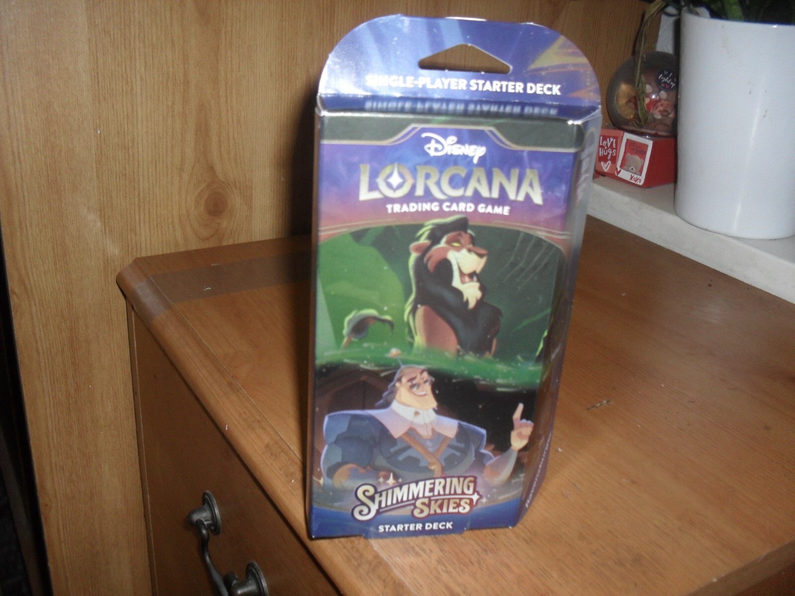 Disney Lorcana Trading Card Game: Shimmering Skies Sleeved Booster starter pack