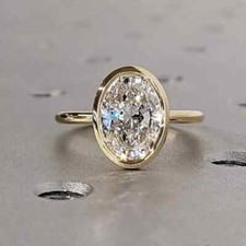 2,35 TCW Ovalschliff Moissanit Zargenfassung Verlobungsring Ehering in 9 K Gelbgold