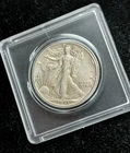 Silver 1943 P  Walking Liberty Half Dollar in plastic holder   TP 10253
