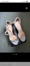 Brand New Size 8 Pretty little thing silver glittery heel sandals.