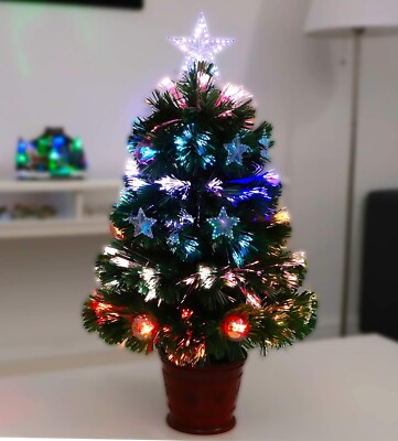 Christmas Concepts  2 Fuß grüner Glasfaserbaum - roter Sockel mit Sternen & Kugeln