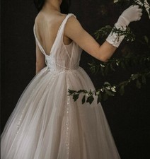 Elaine - V neck sleeveless A-line wedding dress. 