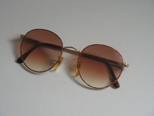 RETRO PAIR OF GIORGIO ARMANI SUNGLASSES WITH OVAL, BROWN, GRADUATED LENSES.