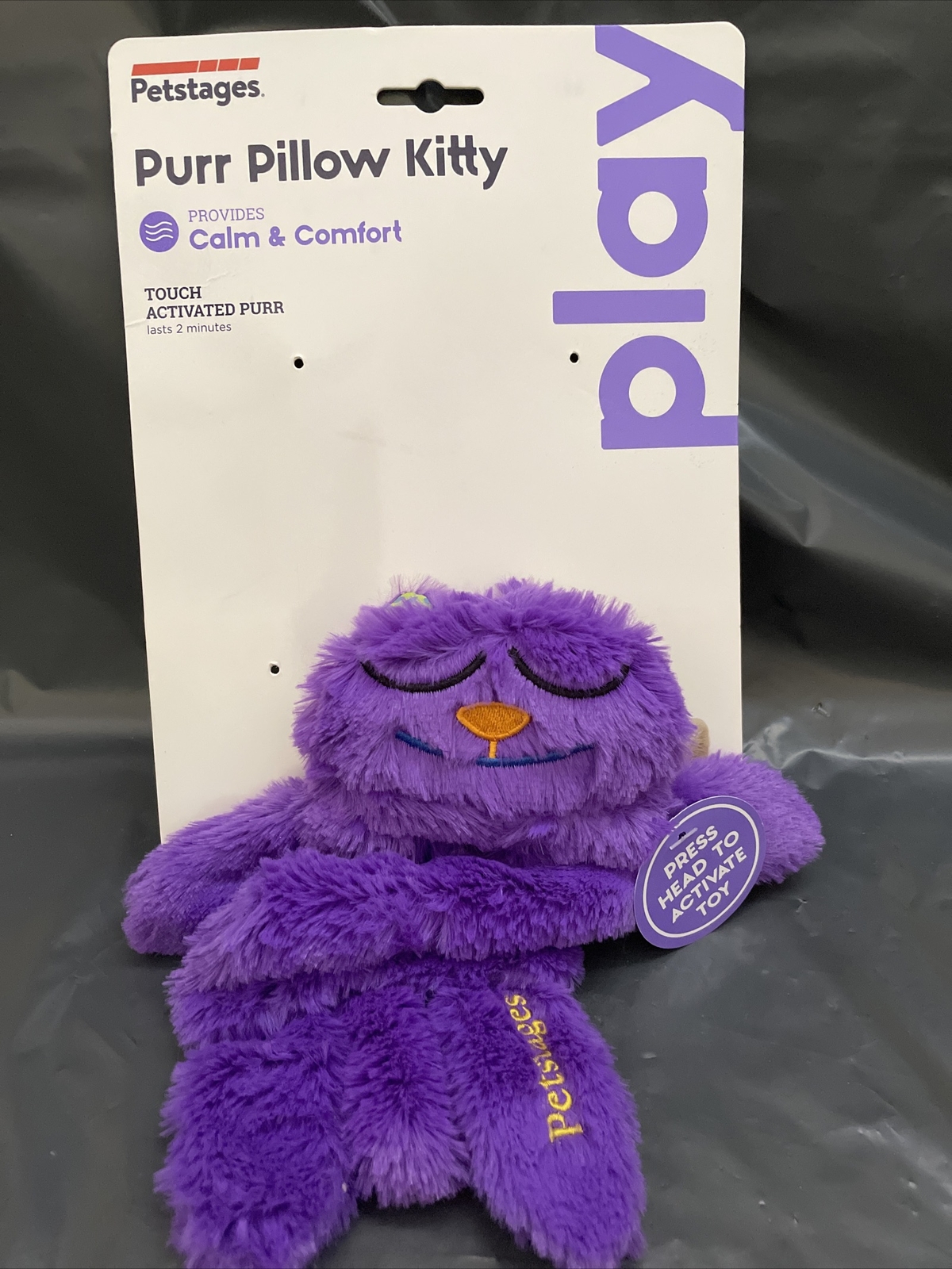 touch activated plush purring cat