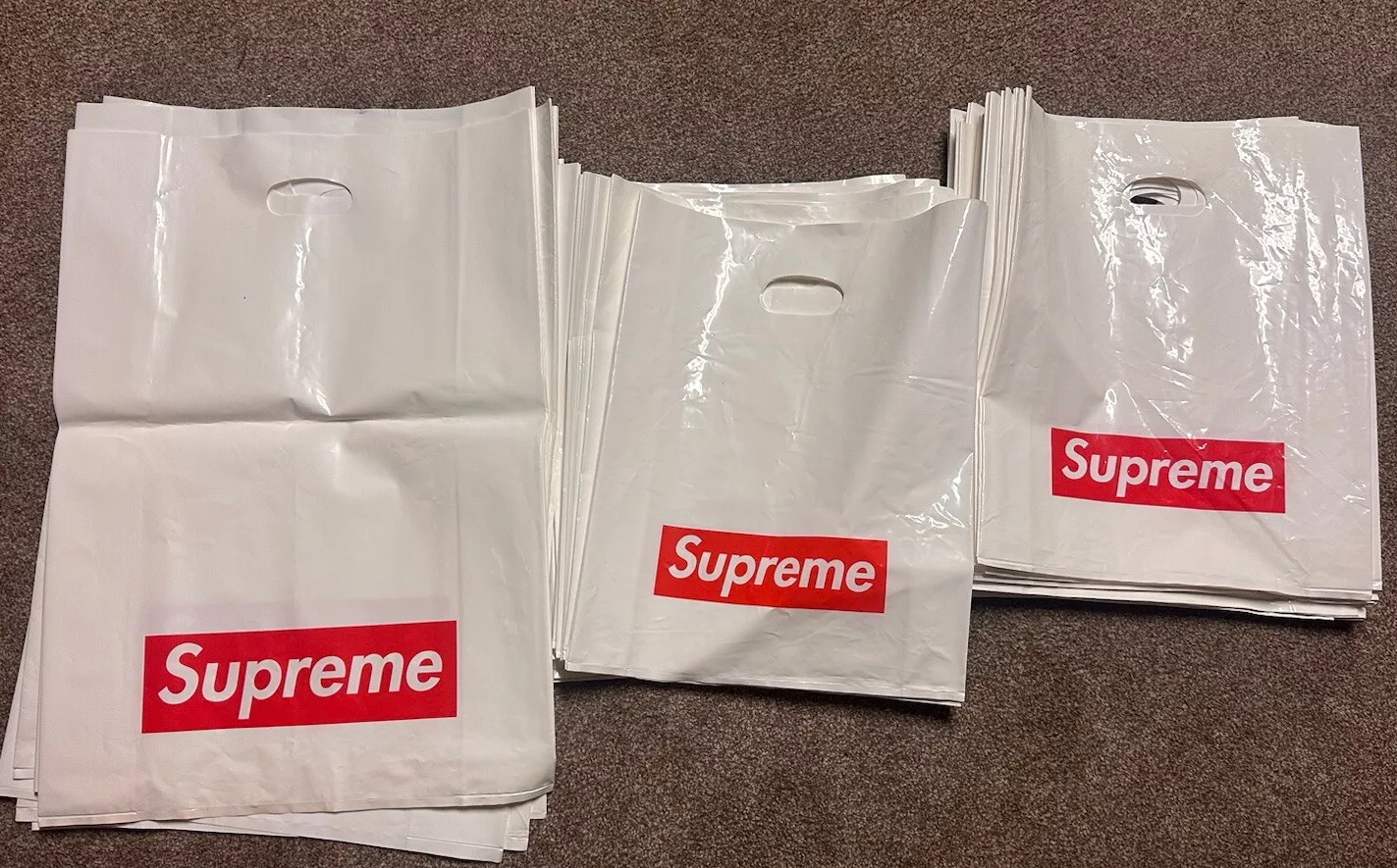 Sac shopping plastique blanc suprême (43) logo boîte rouge 2 tailles 100% authentique