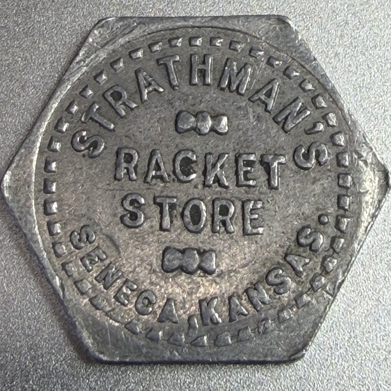 Kansas, Seneca Strathman’s Racket Store Good for 5¢ Aluminum Token 178624