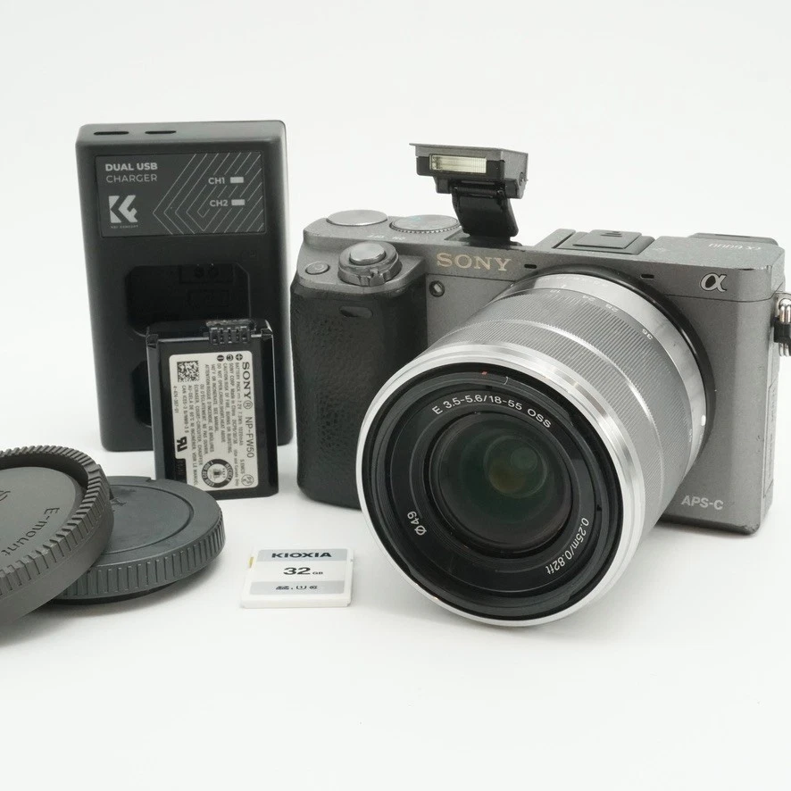 Sony Alpha a6000 gris graphite avec carte SD objectif SEL1855 18-55 mm OSS... - Photo 1/4
