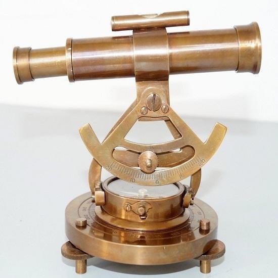 A brass alidade — a surveyor's sighting compass used before GPS — is a genuinely rare, functional antique that almost nobody has seen before.