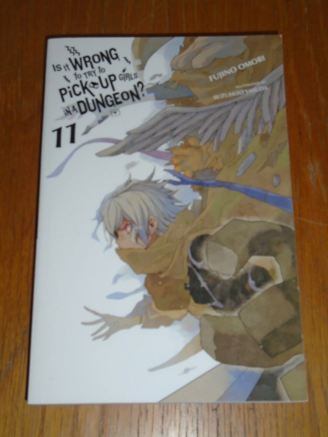 Is It Wrong to Try to Pick Up Girls in a Dungeon?, Vol. 11 (light novel) by Fuj - Image 2