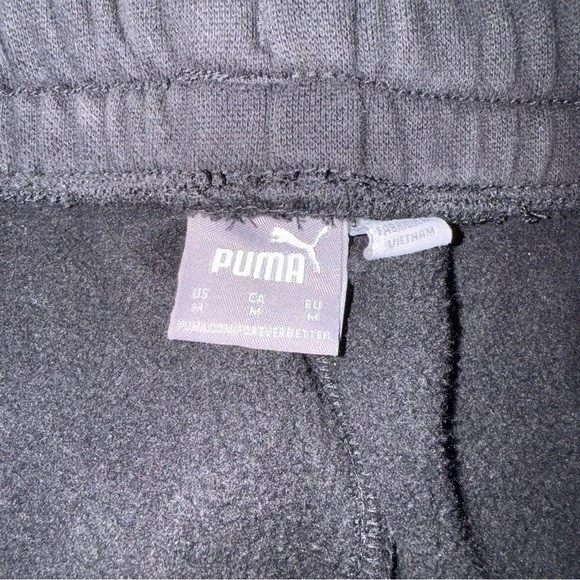 Pantalones deportivos Puma para niñas medianos 8/10 negros forrados de lana usados en excelente estado logotipo Foto 3 de 4