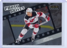 2023-24 O-Pee-Chee Platinum Jack Hughes Photo Driven Insert New Jersey Devils
