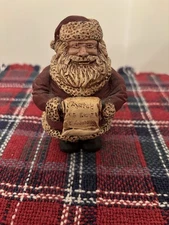 Santa with His Christmas List Figurine