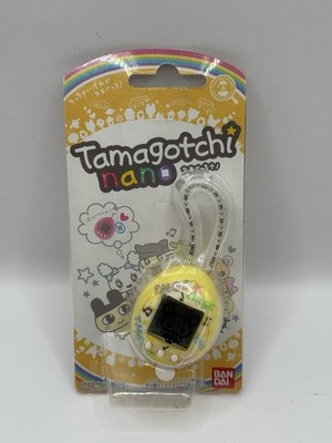 Tamagotchi Nano - Yellow Shell - Wave 1, Oct 2010 - Bandai Virtual