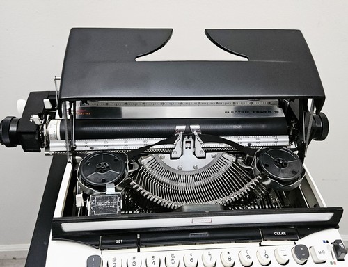 Máquina de escribir Sears Portable Electric Power 12 1973 vintage con estuche FUNCIONA EN MUY BUENA CONDICIÓN EE. UU. - Imagen 12 de 21