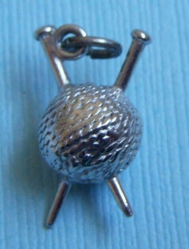 Vintage Wells yarn with knitting needles sterling charm