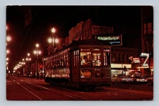 Vintage 1961 New Orleans Streetcar No. 941 on Canal St Night Scene